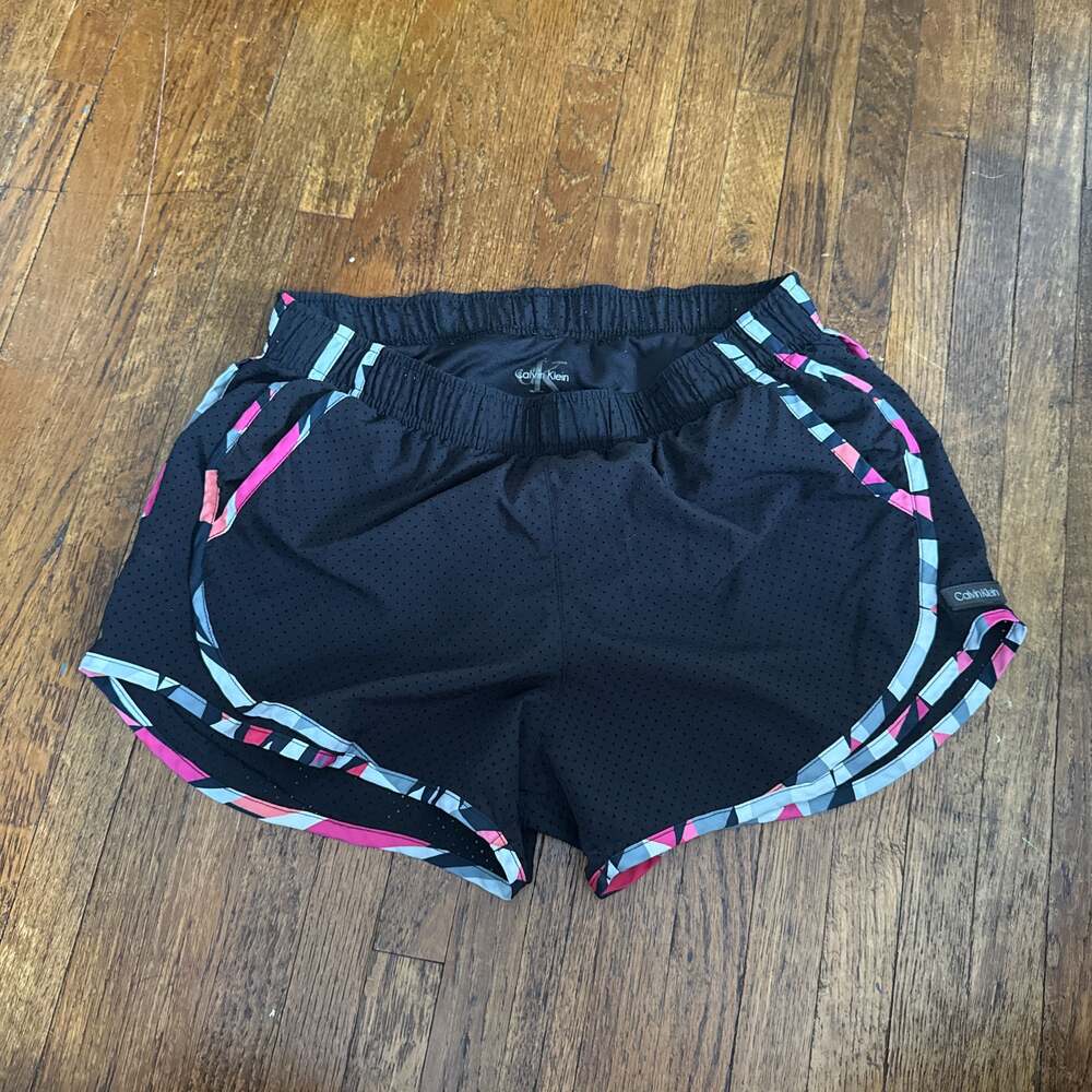 Calvin Klein Women's Perforated Running Shorts with Pockets and Interior Panty